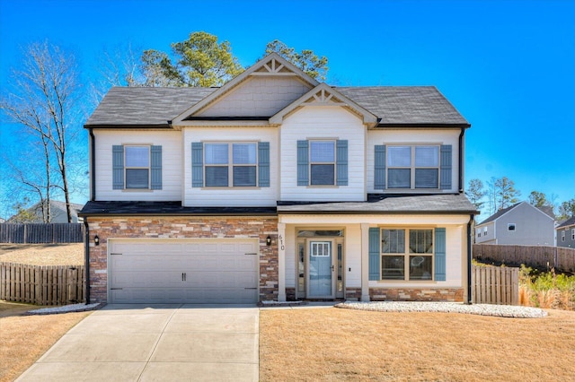 610 Turtle Crk Ln, Harlem, GA 30814 - craftsman inspired home with driveway, an attached garage, stone siding, roof with shingles, and covered porch