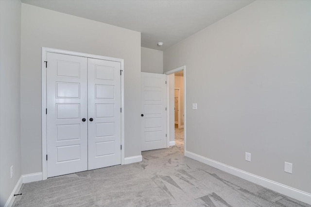 610 Turtle Crk Ln, Harlem, GA 30814 - unfurnished bedroom with carpet flooring, a closet, and baseboards