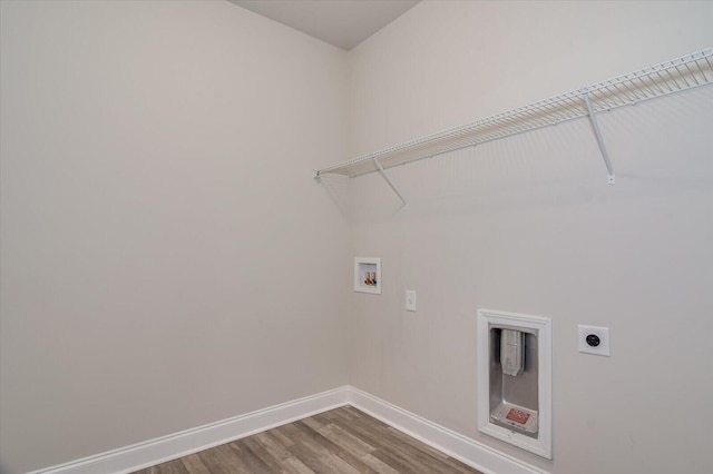 610 Turtle Crk Ln, Harlem, GA 30814 - clothes washing area featuring washer hookup, electric dryer hookup, baseboards, and wood finished floors