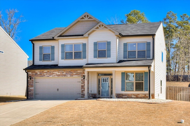 610 Turtle Crk Ln, Harlem, GA 30814 - craftsman inspired home featuring driveway, an attached garage, stone siding, a shingled roof, and a porch