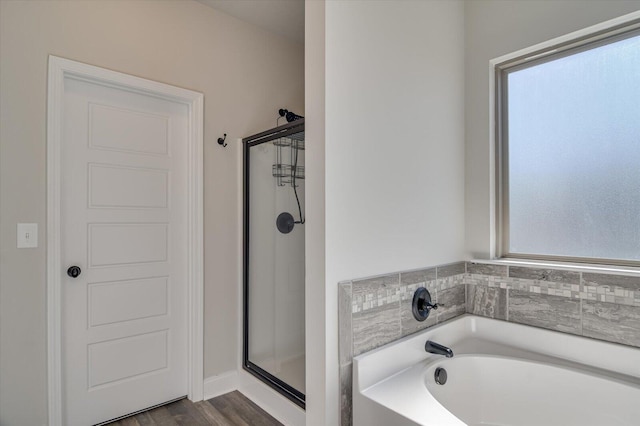 610 Turtle Crk Ln, Harlem, GA 30814 - full bathroom featuring a shower stall, a bath, and wood finished floors