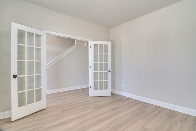610 Turtle Crk Ln, Harlem, GA 30814 - empty room with french doors, light wood-type flooring, and baseboards