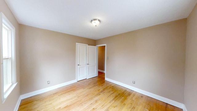 1443 Spring Hill Ter, Augusta, GA 30904 - spare room with a healthy amount of sunlight, baseboards, and light wood finished floors