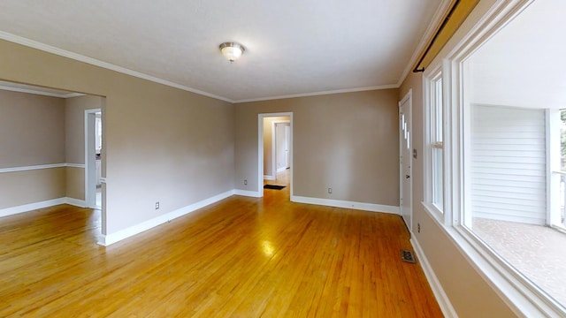 1443 Spring Hill Ter, Augusta, GA 30904 - empty room featuring crown molding, baseboards, light wood-style flooring, and visible vents