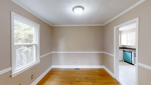1443 Spring Hill Ter, Augusta, GA 30904 - unfurnished room featuring baseboards, light wood-type flooring, a textured ceiling, and visible vents