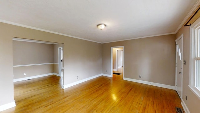 1443 Spring Hill Ter, Augusta, GA 30904 - unfurnished room with baseboards, ornamental molding, light wood finished floors, and visible vents