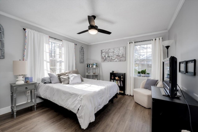 bedroom featuring dark wood-type flooring, ceiling fan, and a textured ceiling