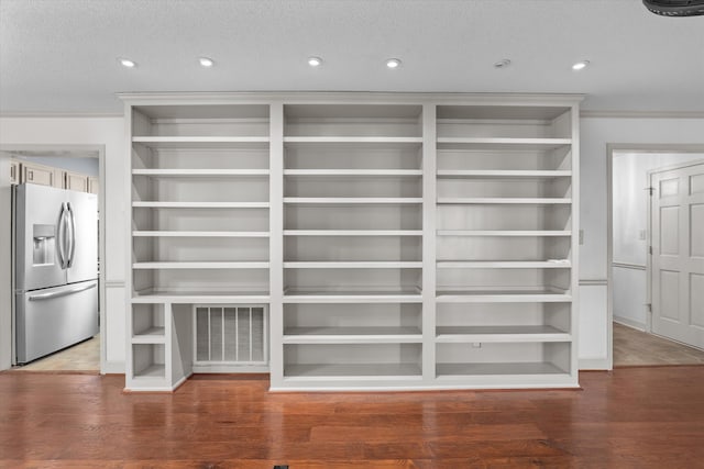 room details with visible vents, open shelves, and stainless steel fridge with ice dispenser