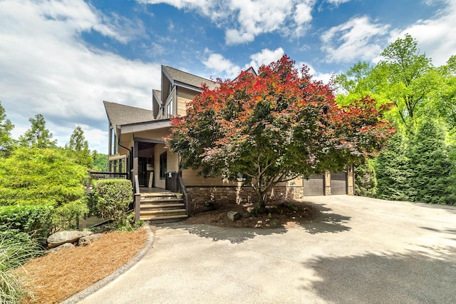 obstructed view of property with covered porch