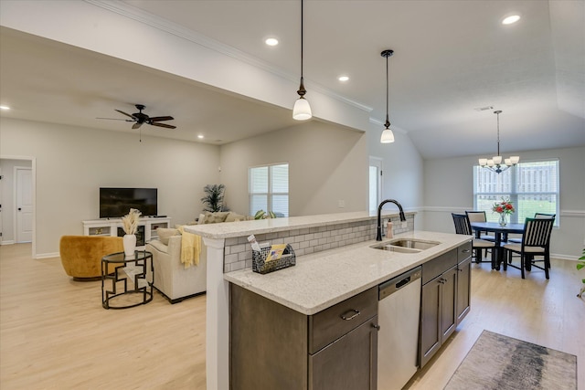 2613 Inverness Dr, Hephzibah, GA 30815 - kitchen featuring stainless steel dishwasher, healthy amount of natural light, light wood-style floors, dark brown cabinets, and recessed lighting