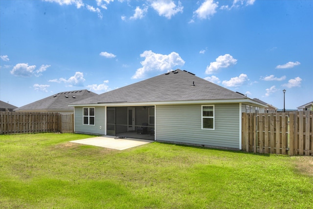 2613 Inverness Dr, Hephzibah, GA 30815 - rear view of property featuring a patio area, a fenced backyard, and a shingled roof