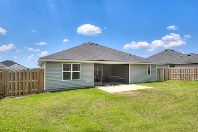 2613 Inverness Dr, Hephzibah, GA 30815 - rear view of house with a patio, a fenced backyard, and a shingled roof