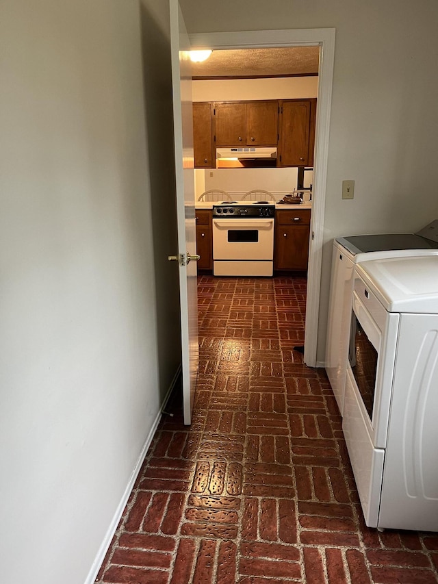 interior space with washing machine and clothes dryer