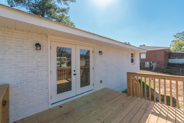 wooden terrace featuring french doors