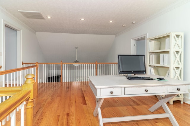 office with recessed lighting, visible vents, ornamental molding, and light wood-style flooring
