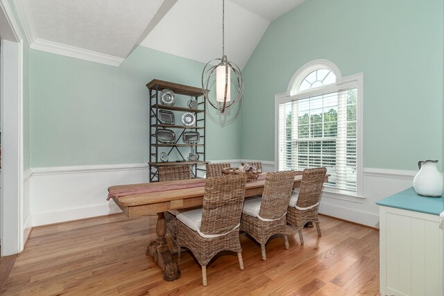 dining room featuring crown molding and wood finished floors