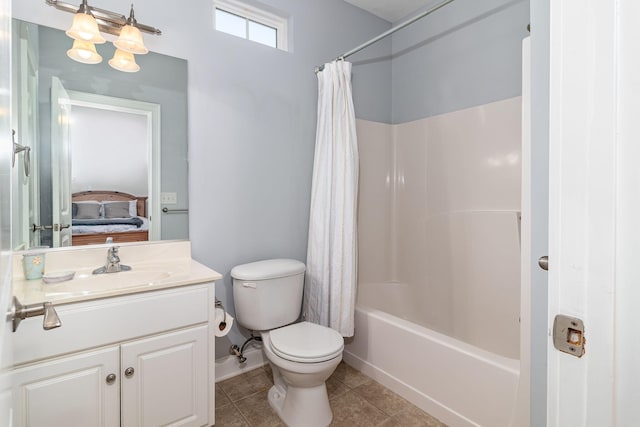 ensuite bathroom featuring vanity, shower / tub combo with curtain, toilet, tile patterned floors, and ensuite bath