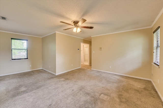 2979 Foxhall Cir, Augusta, GA 30907 - empty room featuring baseboards, ceiling fan, ornamental molding, and light colored carpet
