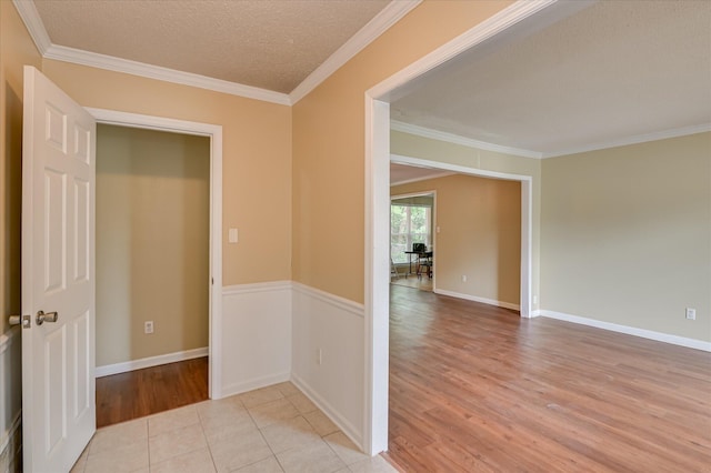 2979 Foxhall Cir, Augusta, GA 30907 - unfurnished room with baseboards, ornamental molding, and light wood-style flooring