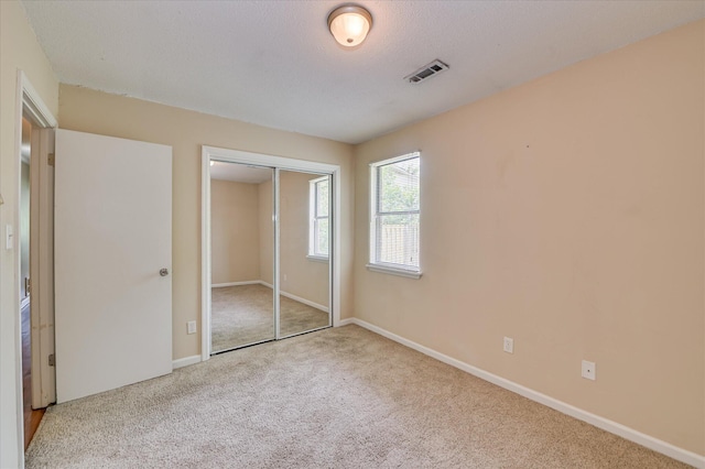 2979 Foxhall Cir, Augusta, GA 30907 - unfurnished bedroom featuring carpet floors, baseboards, a closet, and visible vents