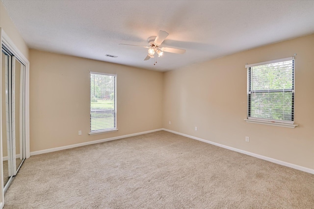 2979 Foxhall Cir, Augusta, GA 30907 - carpeted empty room featuring baseboards, ceiling fan, and visible vents