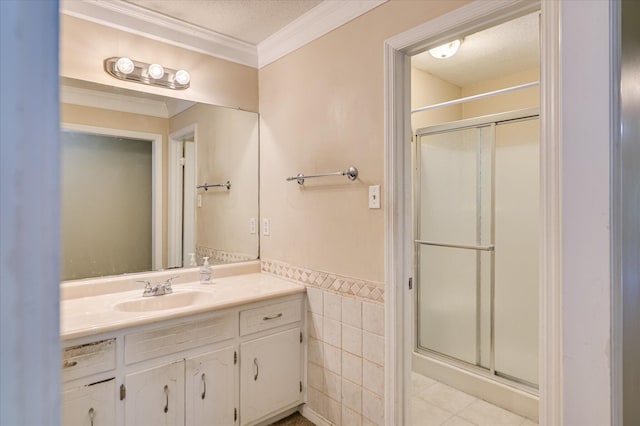 2979 Foxhall Cir, Augusta, GA 30907 - full bathroom featuring crown molding, tile patterned floors, vanity, and a stall shower
