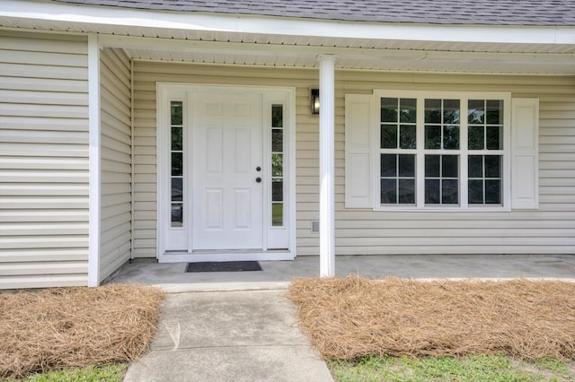 1178 Huntly Cir, Thomson, GA 30824 - doorway to property featuring a shingled roof