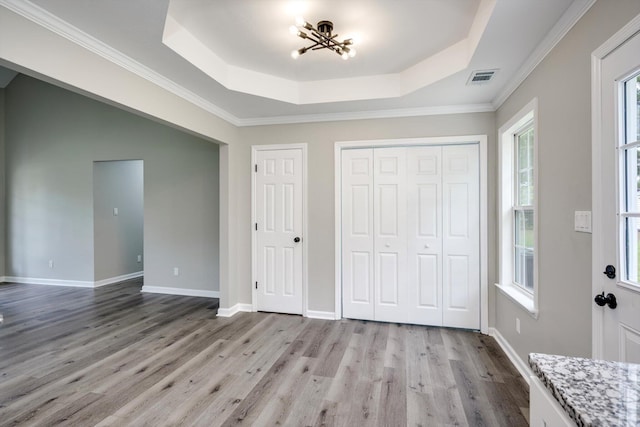 1178 Huntly Cir, Thomson, GA 30824 - foyer entrance with a raised ceiling, wood finished floors, and crown molding