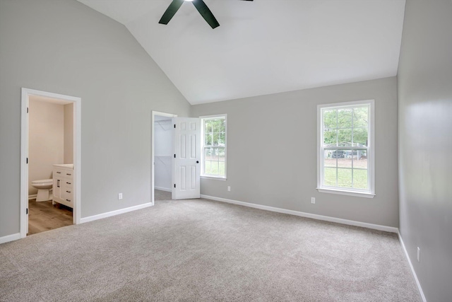 1178 Huntly Cir, Thomson, GA 30824 - unfurnished bedroom with carpet floors, a spacious closet, ensuite bath, high vaulted ceiling, and ceiling fan