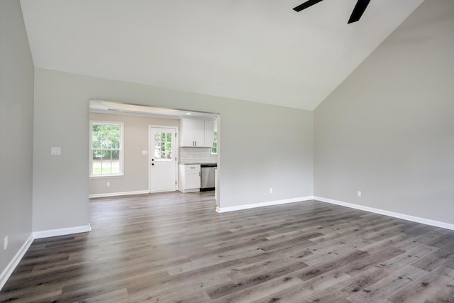 1178 Huntly Cir, Thomson, GA 30824 - unfurnished living room with ceiling fan, lofted ceiling, and dark wood finished floors