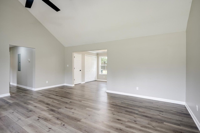 1178 Huntly Cir, Thomson, GA 30824 - spare room with a ceiling fan, high vaulted ceiling, wood finished floors, and electric panel