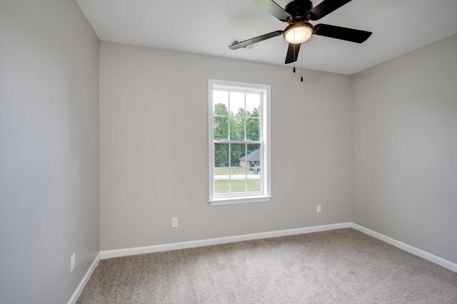 1178 Huntly Cir, Thomson, GA 30824 - spare room featuring plenty of natural light, carpet flooring, and a ceiling fan