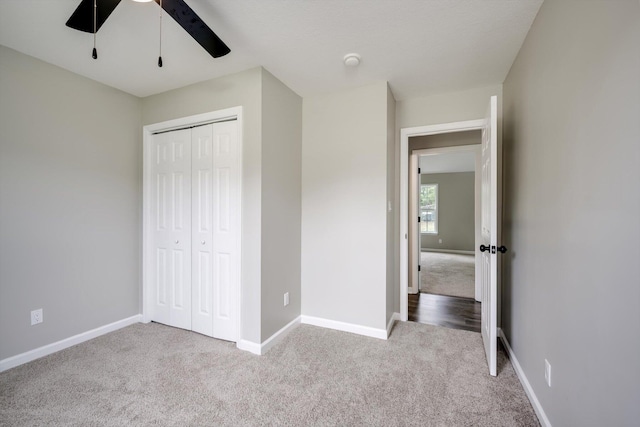 1178 Huntly Cir, Thomson, GA 30824 - unfurnished bedroom with carpet, a closet, and a ceiling fan