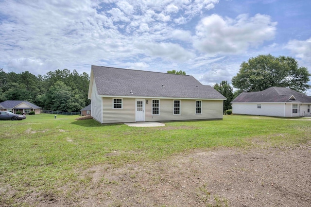 1178 Huntly Cir, Thomson, GA 30824 - rear view of house with a lawn and a patio
