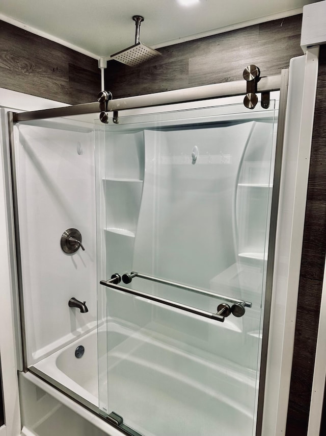 bathroom featuring enclosed tub / shower combo