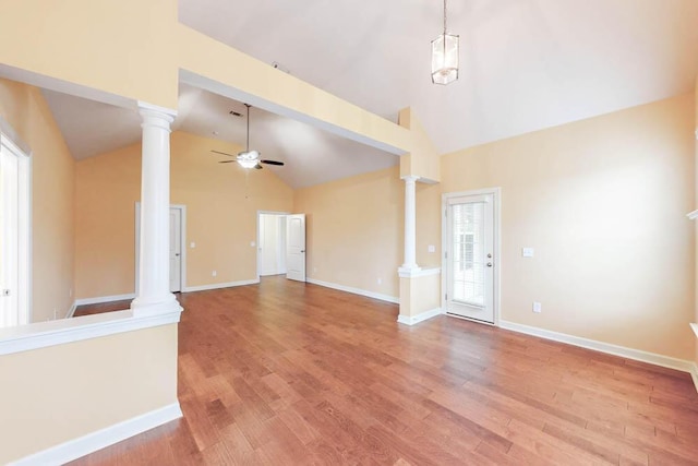 1190 Tralee Dr, Beech Island, SC 29842 - unfurnished living room with ornate columns, ceiling fan, light wood finished floors, and high vaulted ceiling