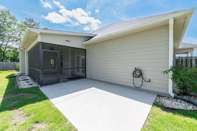 1190 Tralee Dr, Beech Island, SC 29842 - rear view of house with a sunroom and a patio area