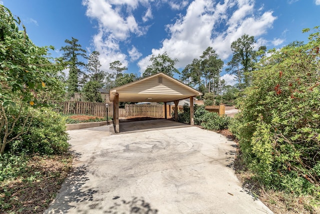 751 Lancaster Rd, Augusta, GA 30909 - view of parking / parking lot featuring driveway and a carport