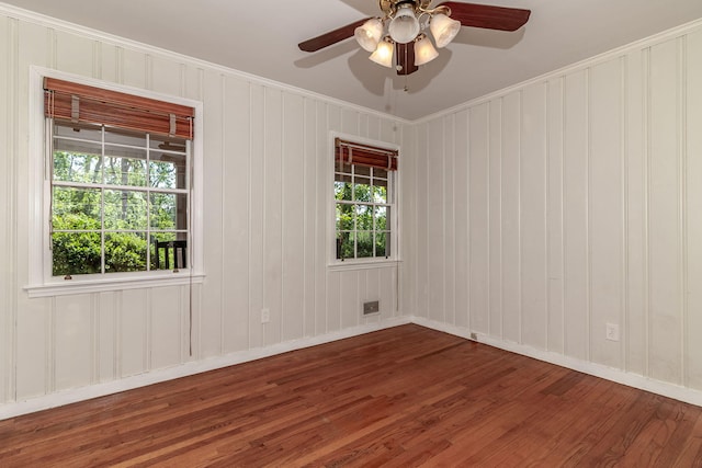751 Lancaster Rd, Augusta, GA 30909 - spare room featuring wood finished floors, baseboards, a ceiling fan, and crown molding