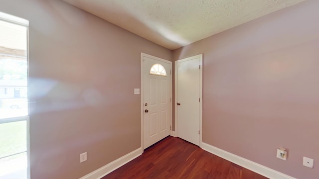 3611 Sturnidae Dr, Augusta, GA 30906 - entrance foyer with baseboards and dark wood-type flooring