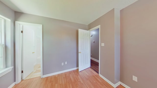 3611 Sturnidae Dr, Augusta, GA 30906 - unfurnished bedroom with light wood finished floors and ensuite bath