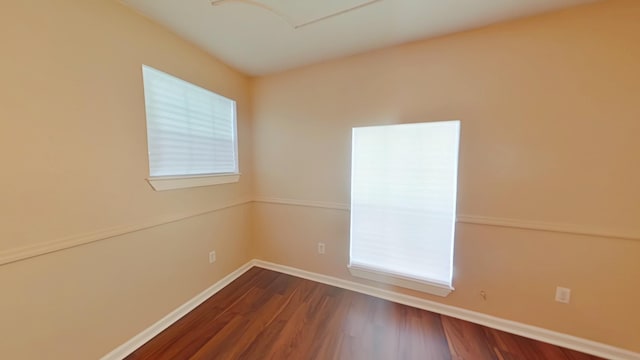3611 Sturnidae Dr, Augusta, GA 30906 - empty room with dark wood finished floors and baseboards