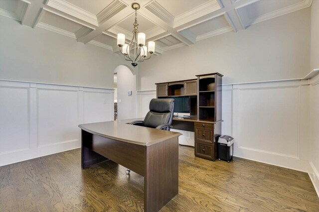 home office with beam ceiling, dark hardwood / wood-style flooring, coffered ceiling, and an inviting chandelier