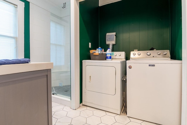2005 Ohio Ave, Augusta, GA 30904 - laundry area featuring washer and clothes dryer and light tile patterned floors
