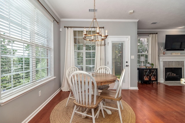 503 Pavilion Ct, Martinez, GA 30907 - dining space with a chandelier, plenty of natural light, wood finished floors, and ornamental molding