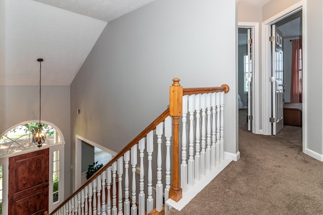 503 Pavilion Ct, Martinez, GA 30907 - corridor featuring an upstairs landing, a chandelier, carpet floors, and vaulted ceiling