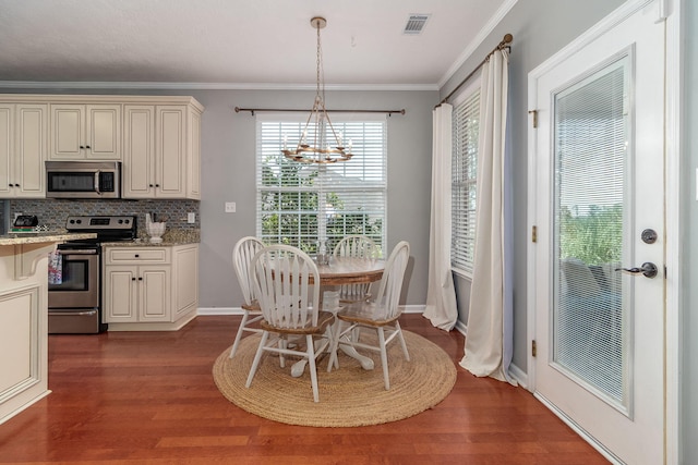 503 Pavilion Ct, Martinez, GA 30907 - dining area featuring a chandelier, dark wood-style floors, and crown molding