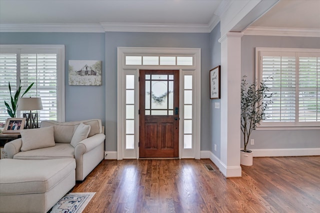 2084 Egret Cir, Evans, GA 30809 - foyer entrance featuring wood finished floors, baseboards, and crown molding