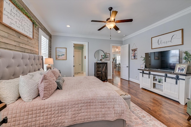 2084 Egret Cir, Evans, GA 30809 - bedroom with crown molding, wood finished floors, recessed lighting, baseboards, and a ceiling fan