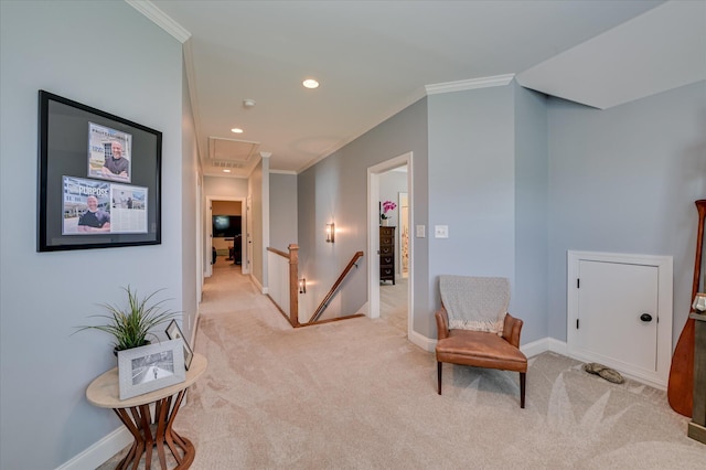 2084 Egret Cir, Evans, GA 30809 - hallway featuring an upstairs landing, crown molding, light colored carpet, attic access, and baseboards
